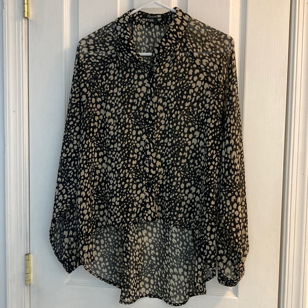 Sheer button up blouse.